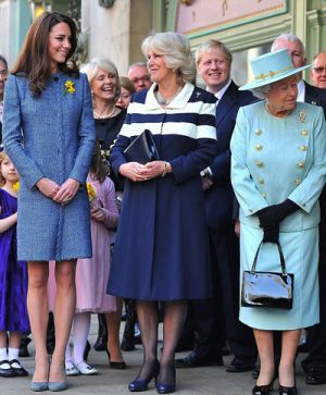 Kate Duchess of Cambridge arrives with Queen Elizabeth II and Camilla Duchess of Cornwall.jpg
